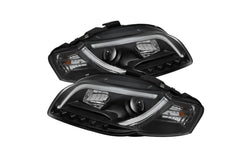 2006-2008 Audi A4 (B7) Black Housing Projector Headlights with DRL Lightbar | SPYDER