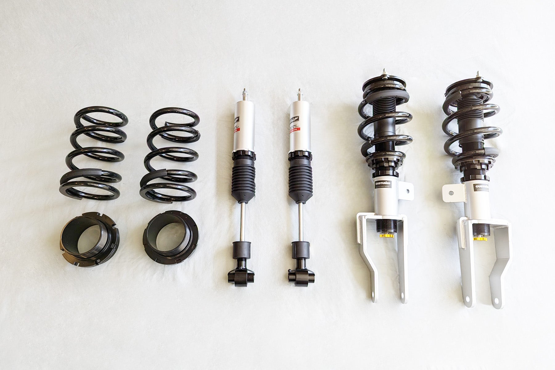 CUSTuning 24-Way Fully Adjustable Coilovers for Tesla Model 3 & Model Y Main image