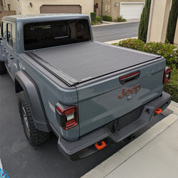 2020-2026 Jeep Gladiator (JT) Revolver X4s Matte Black Aluminum Tonneau Cover with T-Slot Rails | BAK Industries